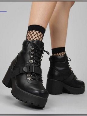 Black platform ankle boots with buckle detail